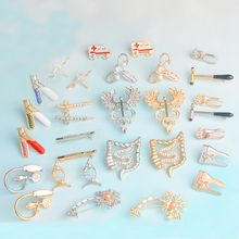 Nurse Doctor Pins Brooches Blood Pressure Meter Neuron Ambulance Uterus Caduceus Massage Reflex Hammer Medical jewelry 2024 - buy cheap