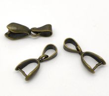 DoreenBeads Retail Antique Bronze Ice Pick Pinch Clip Bails For Pendants With Loop 17x7mm(5/8"x1/4"),sold per pack of 25 2024 - buy cheap