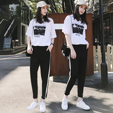 Conjunto feminino de mangas curtas, camisa com calças listradas e de pé de duas peças, moda casual primavera e verão 2018 2024 - compre barato