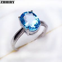 Женское кольцо из серебра 925 пробы с натуральным голубым топазом 2024 - купить недорого