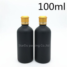 Envío gratis 10 pzas botella de vidrio esmerilado negro 100ML frascos de 100ml botella de aceite esencial con botellas de Perfume de Cubierta dorada 2024 - compra barato
