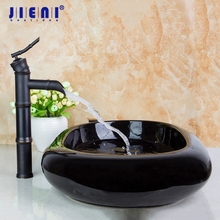 JIENI-lavabo de cerámica ovalado, accesorio artístico europeo, negro, con cascada de bronce frotado con aceite, juego de grifería 2024 - compra barato