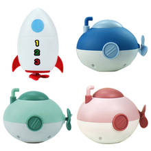 Brinquedo de foguete submarino wind up clockwork banheira do bebê brinquedos crianças presente 2024 - compre barato