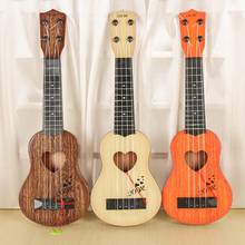 Mini ukulele clássico de quatro cordas, instrumento musical de guitarra para amantes da música, presente para crianças, brinquedos educativos 2024 - compre barato
