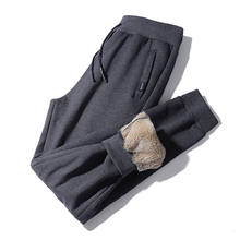 Homens calças de inverno calças de inverno masculino cashmere super quente casual calças térmicas mais veludo engrossar solto calças de cintura elástica 2024 - compre barato