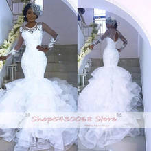 2020 Sexy Sheer See Through African Wedding Dresses Long Sleeves Open Back Tiered Skirts Nigerian Bridal Wedding Gowns 2024 - buy cheap