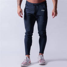 Pantalones de chándal ajustados para hombre, ropa deportiva de algodón para entrenamiento en gimnasio, Color sólido, Otoño, 2019 2024 - compra barato