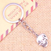 20pcs New Fashion Keychain 21x16mm skeleton head skull Pendants DIY Men Jewelry Car Key Chain Ring Holder Souvenir For Gift 2024 - buy cheap