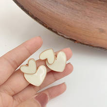 Pendientes de gota coreanos para mujer, aretes de esmalte blanco con doble Corazón, joyería coreana, regalo para niña 2020 2024 - compra barato