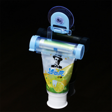 Exprimidor de tubo rodante de plástico, dispensador de pasta Dental, soporte con ventosa, Manual para baño, jeringa, pistola 2024 - compra barato