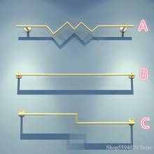 Prateleira moderna simples de ferro dourado, armazenamento de roupas pendurado de parede, cabide de roupas móveis vestuário 2024 - compre barato