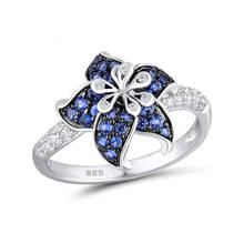 Женское кольцо серебряного цвета с синей звездой цветком и белым фианитом 2024 - купить недорого