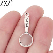 ZXZ-20 colgantes de lupa de plata tibetana para pulsera, collar, joyería, 32x12mm 2024 - compra barato
