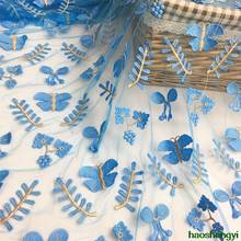 La nueva tela de encaje bordada de poliéster de malla de mariposa, tela de encaje bordada de moda 2024 - compra barato