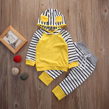 Camiseta con capucha y pantalones largos para recién nacidos, chándal amarillo a rayas, Tops con capucha, pantalones elásticos, 2 uds., 0-3 años 2024 - compra barato