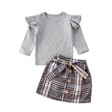 Conjunto de ropa de moda para niños y niñas, camiseta de manga larga con cremallera, Tops + faldas de tubo con botones a cuadros, 2 uds. 2024 - compra barato