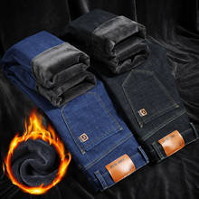 Marca de inverno novo masculino quente velo jeans negócios casual elasticidade densamente magro denim calças marca preto azul 2024 - compre barato
