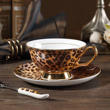 Taza y platillo de café de porcelana de hueso de estilo europeo con estampado de leopardo clásico, juego de té de la tarde de Phnom Penh, traza de estilo europeo 2024 - compra barato