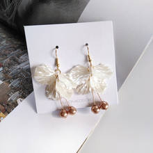 Pendientes coreanos elegantes y simples, aretes con perlas de imitación, pinzas para las orejas, pendientes con pétalos de concha de temperamento japonés, sin perforaciones 2024 - compra barato