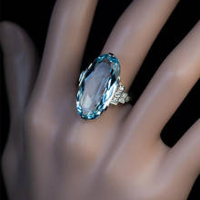 Винтажное женское кольцо с голубым кристаллом, очаровательное серебряное тонкое обручальное кольцо для женщин, модное обручальное кольцо невесты с овальным цирконием 2024 - купить недорого