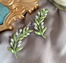 Csxjd moda broche jóias naturais pérolas ramo de oliveira verde broche pino cachecol dedução 2024 - compre barato