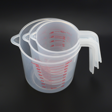 Taza medidora de plástico de 250/500/1000ML, jarra para superficie de boquilla, suministros de herramientas de cocina, taza de calidad con cocina de calidad graduada 2024 - compra barato