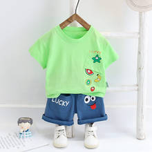 Ropa de verano de algodón para niños y niñas, camisetas con bolsillo de dibujos animados, pantalones cortos, 2 unids/set/conjunto, conjuntos de chándales para niños pequeños 2024 - compra barato