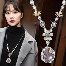 Женское длинное ожерелье с цветком, украшенное кристаллами 2024 - купить недорого