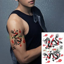 Водостойкая временная татуировка наклейка летающий дракон в красных облаках креативные поддельные тату флэш-тату большого размера татуировки для женщин и мужчин 2024 - купить недорого