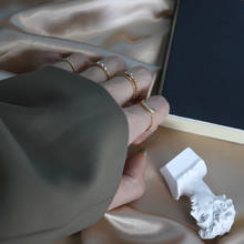 Минималистичный набор золотых колец с лунным цирконием для женщин 2021 панковские геометрические круглые крученые кольца на шарнирах женские модные ювелирные изделия на пальцах 2024 - купить недорого