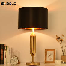 Lámpara de mesa posmoderna para salón dormitorio personalidad creativa lámpara de escritorio E27 lámpara de mesa accesorio de iluminación de oro 2024 - compra barato