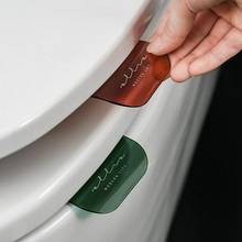 3 cor titular do assento do toalete levantador sanitário closestool tampa de assento elevador lidar com tampa de assento do toalete levantador ferramenta de limpeza do banheiro 2024 - compre barato