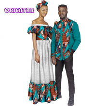 Ropa africana para parejas, Vestido largo de encaje blanco con cuello de barco para hombre y mujer, camisa de retales estampada de África, vestidos de fiesta de boda WYQ145 2024 - compra barato