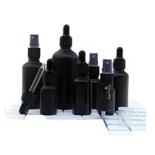 Botella de vidrio con pulverizador para aceites esenciales, botella dispensadora de 5/100ML, con gotero de cristal, color negro mate 2024 - compra barato
