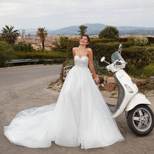 Vestido de novia elegante con corsé de cola larga, escote en forma de corazón, sin mangas, para boda 2024 - compra barato