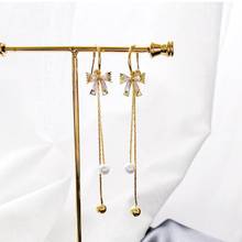 Korean Girl Earrings 2021 Fashion New Temperament Earrings Personality Net Red Bow Pearl Crystal Tassel Long Earrings Sale 2024 - buy cheap