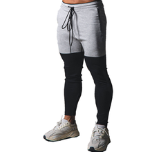 Contraste Color Mens sudaderas pantalones para trotar hombre gimnasios entrenamiento Fitness algodón Pantalones Hombre Casual moda Skinny Track Pants 2024 - compra barato