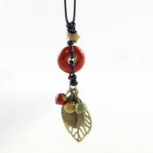Ожерелье с подвеской в этническом стиле с листьями и керамическими бусинами ручной работы N261 2024 - купить недорого