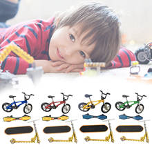 4 peças mini dedo brinquedos fingerboard skates bicicleta scooter pequeno balanço 2024 - compre barato