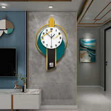 Современный простой часы Северная Европа модные креативные настенные часы для гостиной, художественное украшение для дома, часы простой светильник класса люкс на стену 2024 - купить недорого