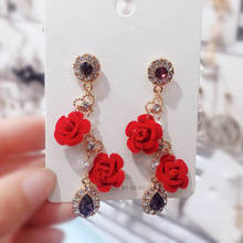 Pendientes largos de flores rojas para mujer, aretes largos con borlas de perlas de imitación, temperamento elegante coreano, novedad 2024 - compra barato