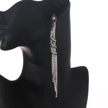 Женские Висячие серьги с кристаллами YFJEWE, черные и белые длинные висячие серьги с кисточками, ювелирное изделие, подарок E699 2024 - купить недорого