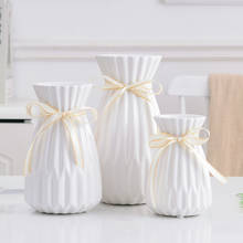 Jarrón de cerámica blanco con pajarita, mini florero para decoración de bodas, florero moderno simple, accesorios de mesa para sala de estar 2024 - compra barato