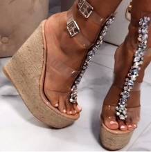 Sandalias con punta abierta para mujer, zapatos sexys con diamantes de imitación, transparentes, con correa en T de PVC, con plataforma adornada de cristal, con hebilla superalta 2024 - compra barato