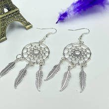 Pendientes de plumas de Pu Mengwang, aretes de plumas de borla de estilo étnico bohemio 2024 - compra barato