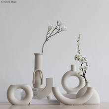 Nórdico fora-branco cerâmica especial-em forma de vaso moderno decoração para casa ornamentos simples mini/flor arranjo acessórios 2024 - compre barato