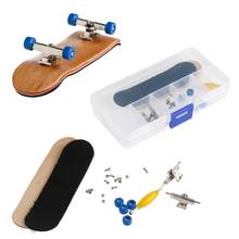 1 conjunto de madeira fingerboard skate com caixa crianças deck jogo esporte presente bordo novidade dedo brinquedo para adultos crianças 6 cores 2024 - compre barato