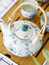 Juego de té de cerámica de estilo japonés, tetera de suspensión para el hogar, tetera taza Kung Fu, té negro Da Hong Pao, caja de regalo 2024 - compra barato