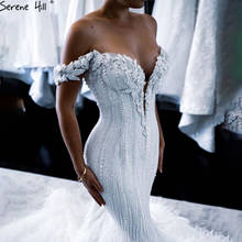 Vestidos de novia de lujo de sirena blanca, elegantes vestidos de novia con plumas de perlas 2021, a medida, Serene Hill 2024 - compra barato