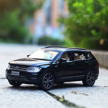 Modelo de coche Volkswagen Tiguan 1:32, coche de aleación fundido a presión, modelo de coche de juguete seis abiertos, juguetes coleccionables para niños, Envío Gratis 2024 - compra barato